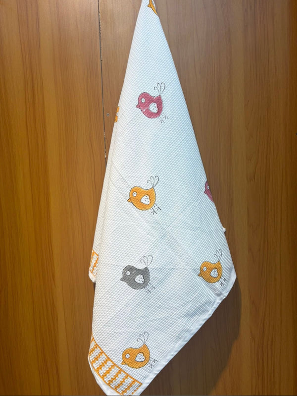 Chirpy Chintu waffle handblock printed baby towel with colorful bird motifs – Newkasa.
Handblock printed waffle cotton baby towel featuring pink, yellow, and grey birds – Newkasa.
Jaipuri waffle baby towel with chirping bird print and yellow border – Newkasa.