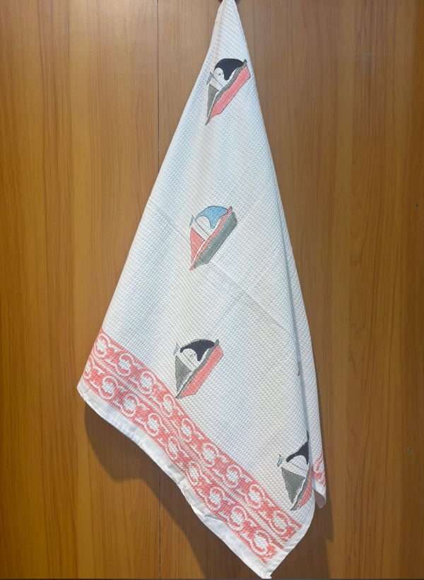 Pip the Penguin waffle handblock printed hooded baby towel – Newkasa.
Handblock printed waffle cotton hooded towel featuring penguin in a boat – Newkasa.