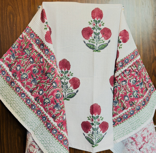 “Newkasa Gulmohar Jaipuri Hand Block Printed Cotton Waffle Bath Towel with red floral motifs and intricate borders, handcrafted in Jaipur Rajasthan — lightweight, absorbent, and 100% cotton towel for spa, resort, and home use.”