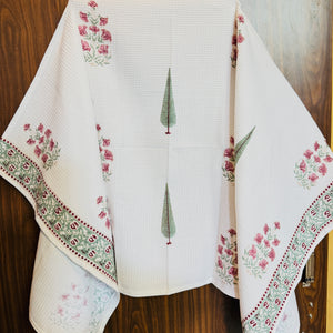 “Newkasa Gulnaar Jaipuri Hand Block Printed Cotton Waffle Bath Towel with pink floral and green cypress motifs, handcrafted in Jaipur Rajasthan — lightweight, soft, absorbent 100% cotton towel for spa, home, and resort use.”